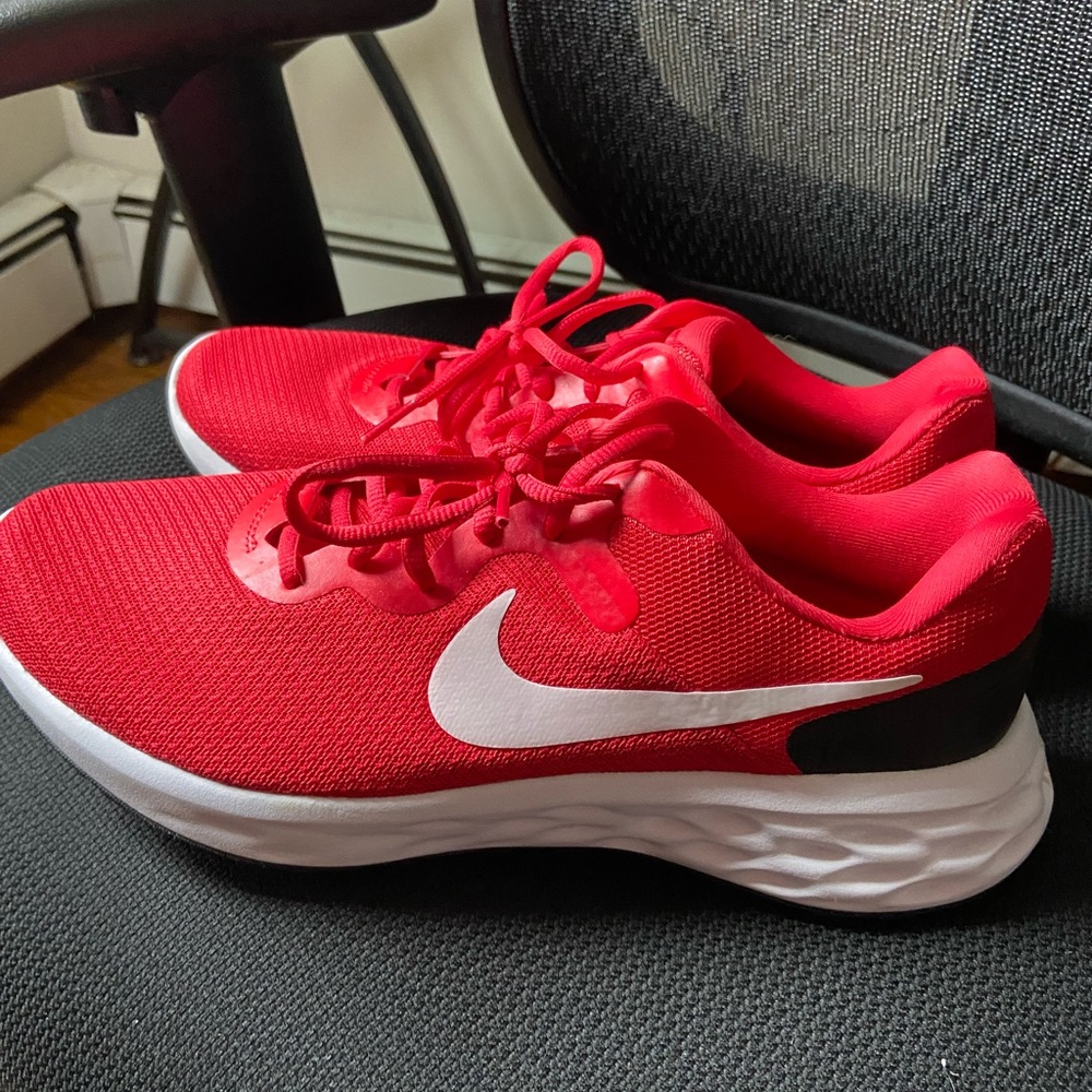 Red Nike running shoes men’s size 10 Very clean no wear & tear